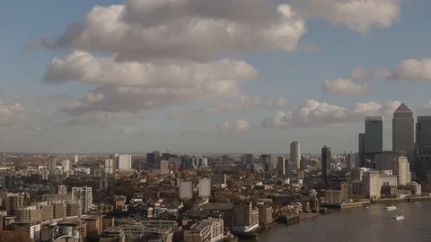 Aerial panning view of the financial district of the Docklands in London Stock Footage 101203133