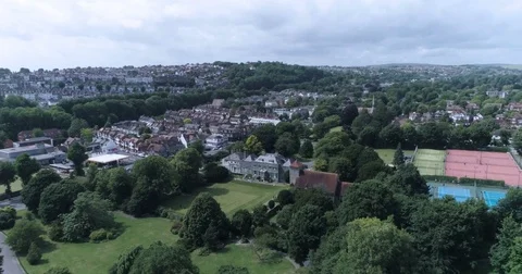 Aerial panning view of the North part of the town of Brighton Stock Footage