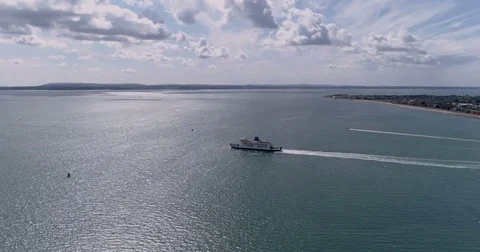 Aerial panning view of a passenger ship sailing Stock Footage 79662431