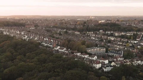 Aerial panning view of a typical Edwardian village in North London at sunset Stock Footage 101907681