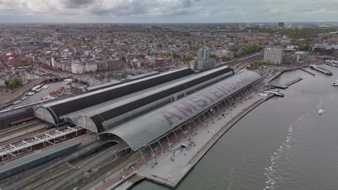 Aerial panorama of Amsterdam with central train station with sign on its roof Stock Footage 326022650