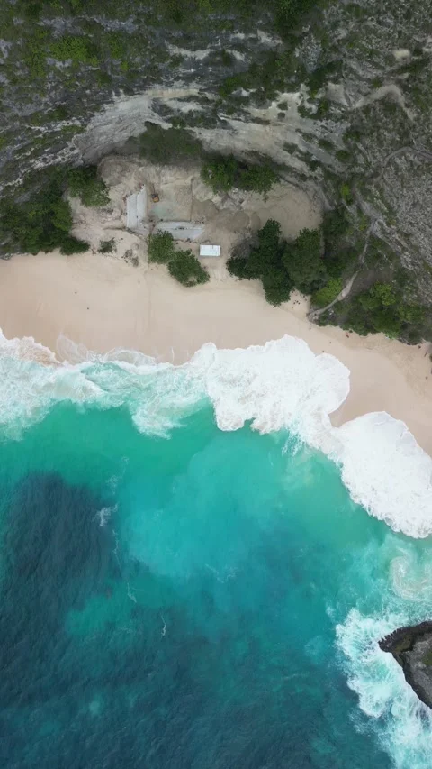 Aerial Panorama of Bali Oceanfront Cliffs and Clear Blue Waves Drone 4k Video stock 296538730