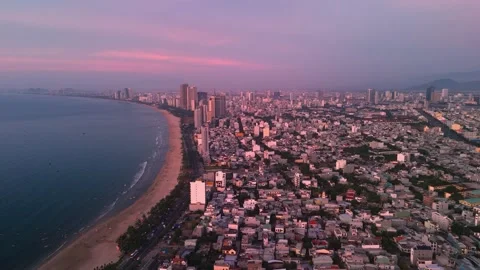 Aerial panorama capturing da nangs contemporary skyline, golden sunlight Stock Footage 310611954