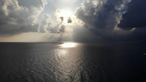 Aerial panorama on dramatic sky and sea, sun shine through clouds Stock Footage 98648968