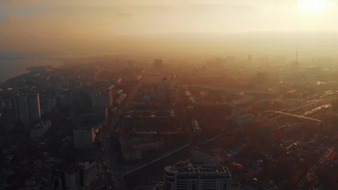 Aerial panorama of dramatic sunset above evening Voronezh city in haze or fog Video stock 97985243