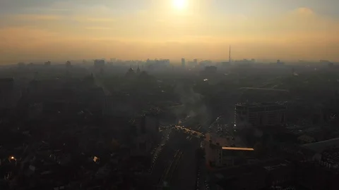 Aerial panorama of dramatic sunset above evening Voronezh city in haze or fog Stock Footage 98836582
