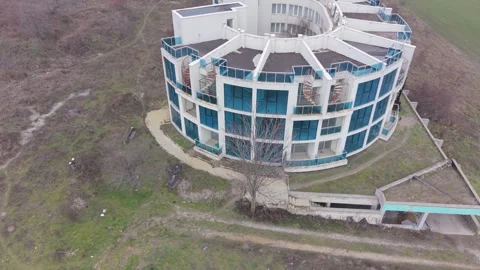 Aerial panorama of new structures standing empty near rural road Stock Footage 328828675