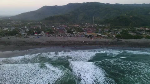 Aerial panorama of Parangkusumo beach on Java island during kite festival Stock Footage 155675341