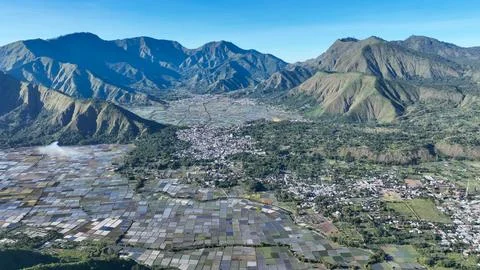 Aerial panorama of Sembalun with its patchwork rice fields and dramatic mou.. 写真素材