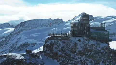 Aerial panorama view of the Sphinx Observatory on Jungfraujoch - Top of Europe Stock Footage 235347229