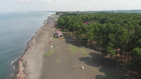 Aerial panoramic ascending fly over black sea shore in Shekvetili village wit Stock-Footage 145694915
