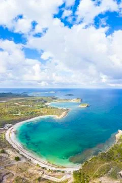 Aerial panoramic by drone of Half Moon Bay washed by Caribbean Sea, Antigua, Stock Photos
