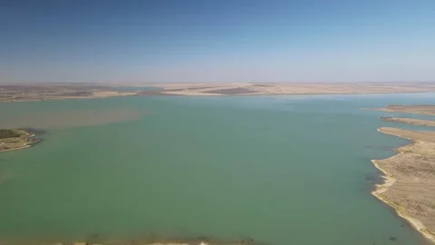 Aerial panoramic drone shot of a large reservoir Stock Footage 337479849