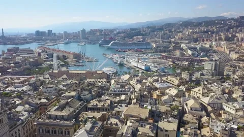 Aerial panoramic drone view of buildings and streets surrounding Port of Genoa Video stock 151296643