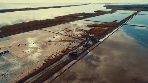 Aerial panoramic drone view of Pomorie salt pans townscape at sunse. Видео 119721196