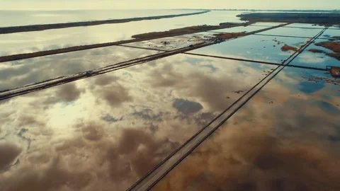 Aerial panoramic drone view of Pomorie salt pans townscape at sunse. Stock Footage 119721373