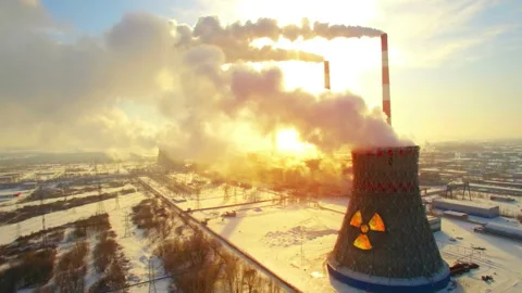Aerial panoramic flight of hyperlaps around the nuclear power plant. Winter Stock Footage 124582052