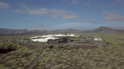Aerial panoramic footage camera flight above the underground cave housing Stock Footage 85013080