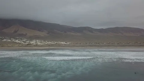 Aerial panoramic footage camera flight along the coast of Lanzarote Island. Stock Footage 85304396