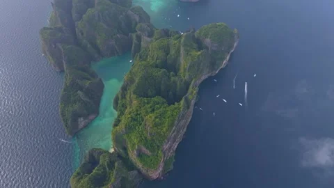 Aerial panoramic of Koh Phi Phi Lee with Maya Bay and Phi Leh Bay Stock Footage 303357643