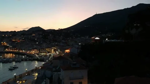 Aerial panoramic night cityscape view over Parga coastal city, Epirus, Greece Stock Footage 152838947