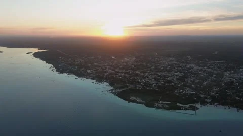 Aerial Panoramic Pan Over Bacalar Town at Golden Hour Sunset, Mexico Stock Footage 342593054