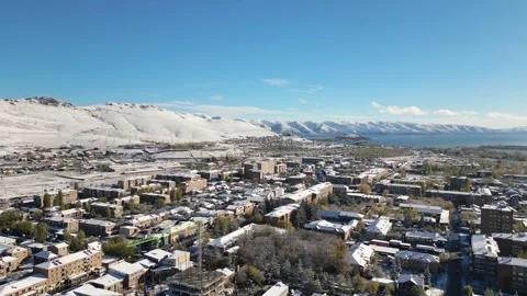 Aerial panoramic panning view Sevan town and Lake Sevan. Famous Sevan lake .. Stock Footage 290179114