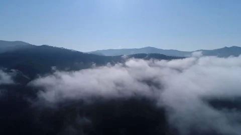 Aerial panoramic shot above the clouds in mountain Stock Footage 80163074