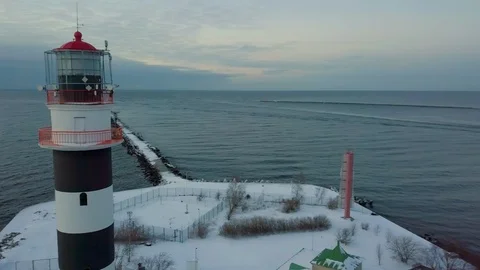 Aerial panoramic shot of the lighthouse and a ship entering the harbour Stock Footage 101827966