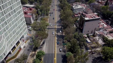Aerial panoramic view above traffic in the south of Mexico City Stock Footage 150403475