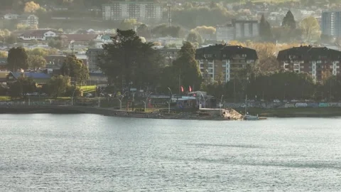 Aerial panoramic view of the activity of the Playa Pucar viewpoint park in .. Stock Footage 289148441
