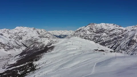 Aerial panoramic view of Alps, landscape panorama of snowy mountains in winter Stock-Footage 103601890