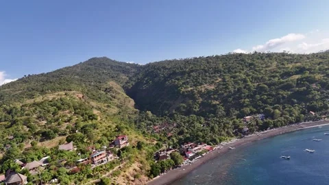 Aerial panoramic view of Amed beach in Bali. Mount Agung volcano. Stock Footage 283955262