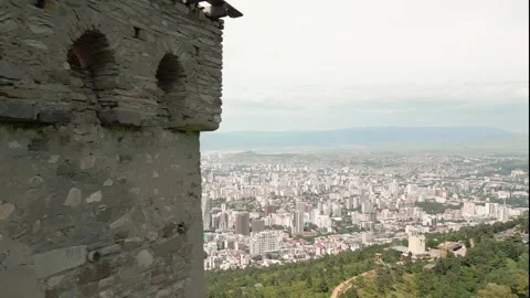 Aerial panoramic view ancient Svan defensive old tower above Turtle Lake, o.. Stock Footage 311217221