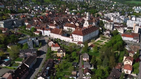 Aerial panoramic view around the old town of Delemont  in Switzerland Vídeos de archivo 308805356