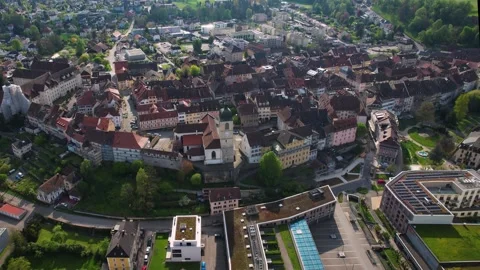 Aerial panoramic view around the old town of Porrentruy  in Switzerland Stock Footage 308805418