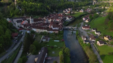 Aerial panoramic view around the old town of Saint-Ursanne  in Switzerland Stock Footage 308805675