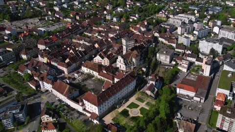 Aerial panoramic view around the old town of Delemont  in Switzerland Vidéo 308809723