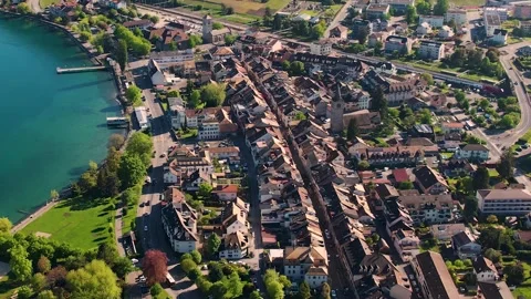 Aerial panoramic view around the old town of Villeneuve  in Switzerland Stock Footage 308812396