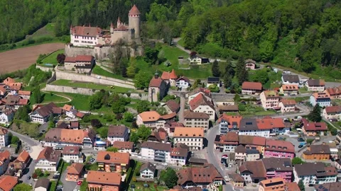 Aerial panoramic view around the old town of Lucens  in Switzerland Stock Footage 308812850