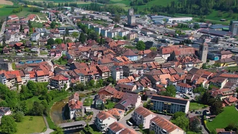 Aerial panoramic view around the old town of Moudon  in Switzerland Stock Footage 308813030