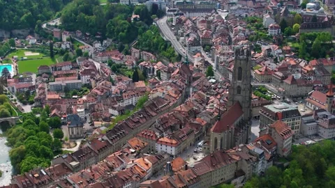 Aerial panoramic view around the old town of Fribourg  in Switzerland Stock Footage 308813312