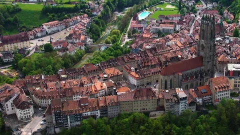 Aerial panoramic view around the old town of Fribourg  in Switzerland Vídeos de archivo 308813320