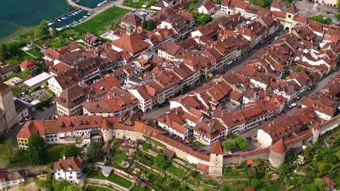 Aerial panoramic view around the old town of Murten  in Switzerland Stock Footage 308813468