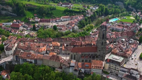 Aerial panoramic view around the old town of Fribourg  in Switzerland Stock Footage 308814840