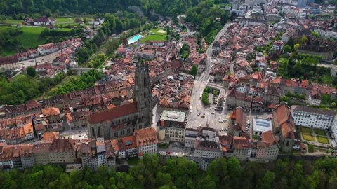 Aerial panoramic view around the old town of Fribourg  in Switzerland Stock Footage 308820622