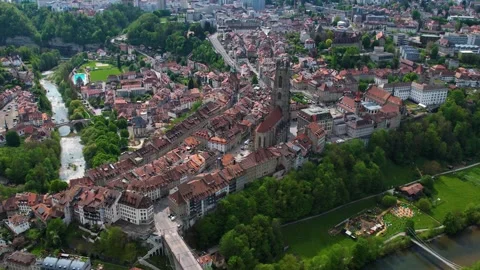 Aerial panoramic view around the old town of Fribourg  in Switzerland Vídeo Stock 308820927