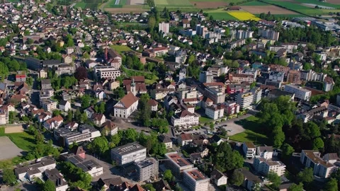 Aerial panoramic view around the old town of Wohlen  in Switzerland Stock Footage 308825507