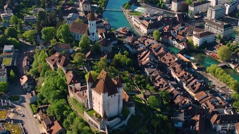 Aerial panoramic view around the old town of Thun in Switzerland Видео 308827188