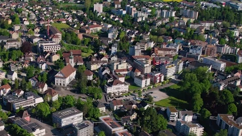 Aerial panoramic view around the old town of Wohlen  in Switzerland Vidéo 308828622